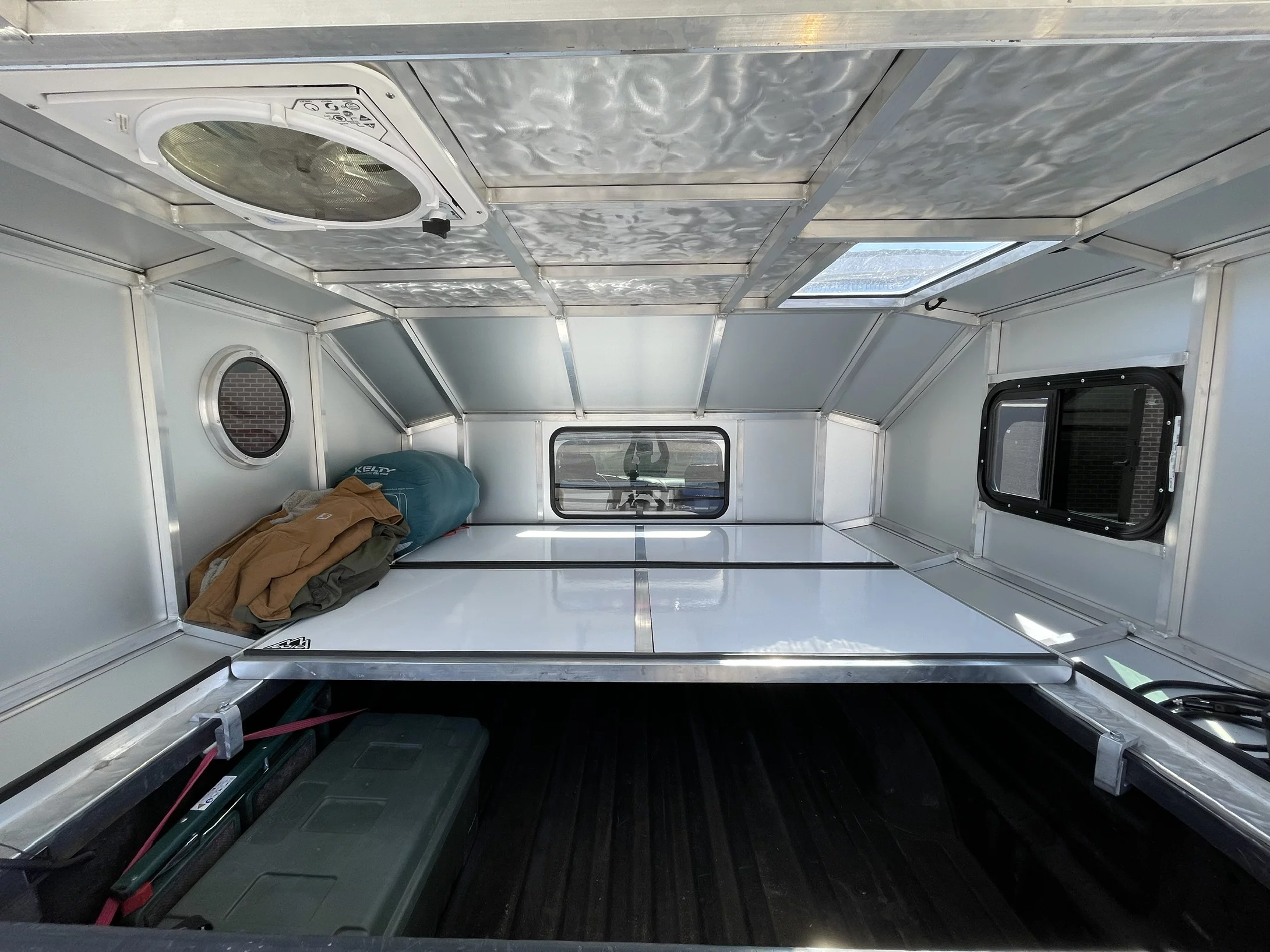 By creating a transverse bed with its wide body, Radica makes it easier to camp in the short bed pickups preferred by off-roaders