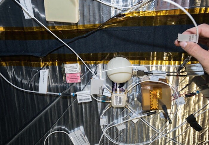 Astronauts have started a new radiation test in the BEAM, putting a semi-spherical 3D printed shield over one of two radiation sensors