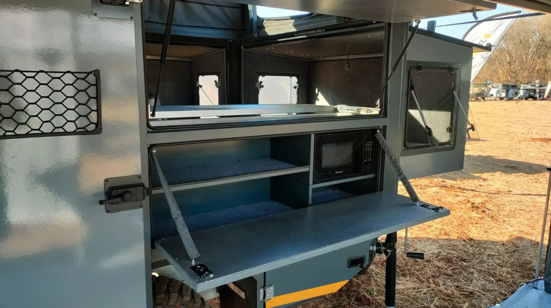 Square Drop Rear Hatch Squaredrop camper unfurls in all directions into off-grid micro-condo