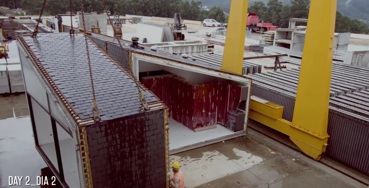 The first module is readied for loading onto the truck