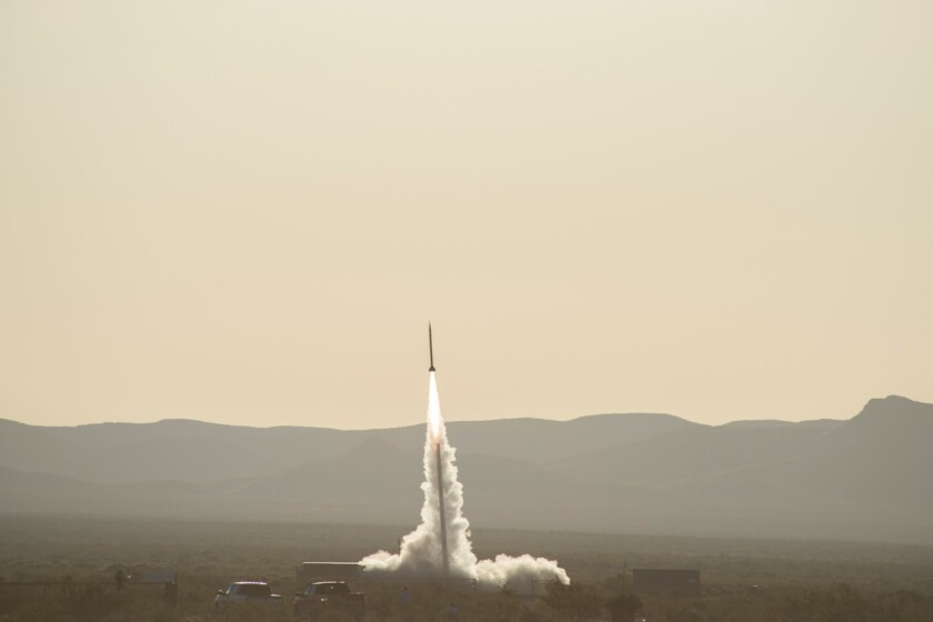 Test rocket lifting off in New Mexico