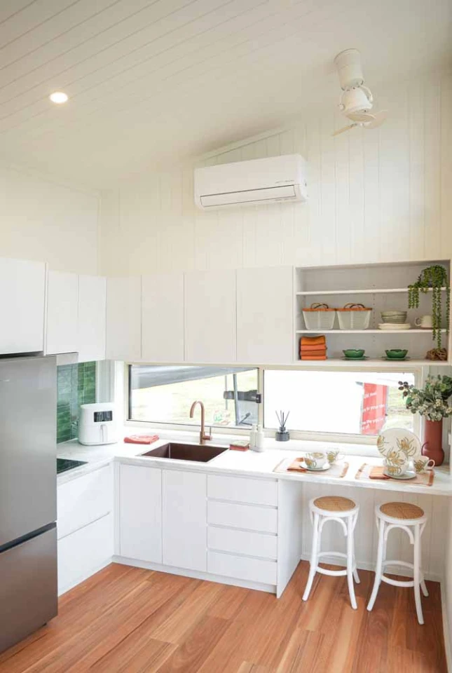 The Kookaburra 2.0's additional width creates a more roomy and apartment-like living space compared to a standard tiny house