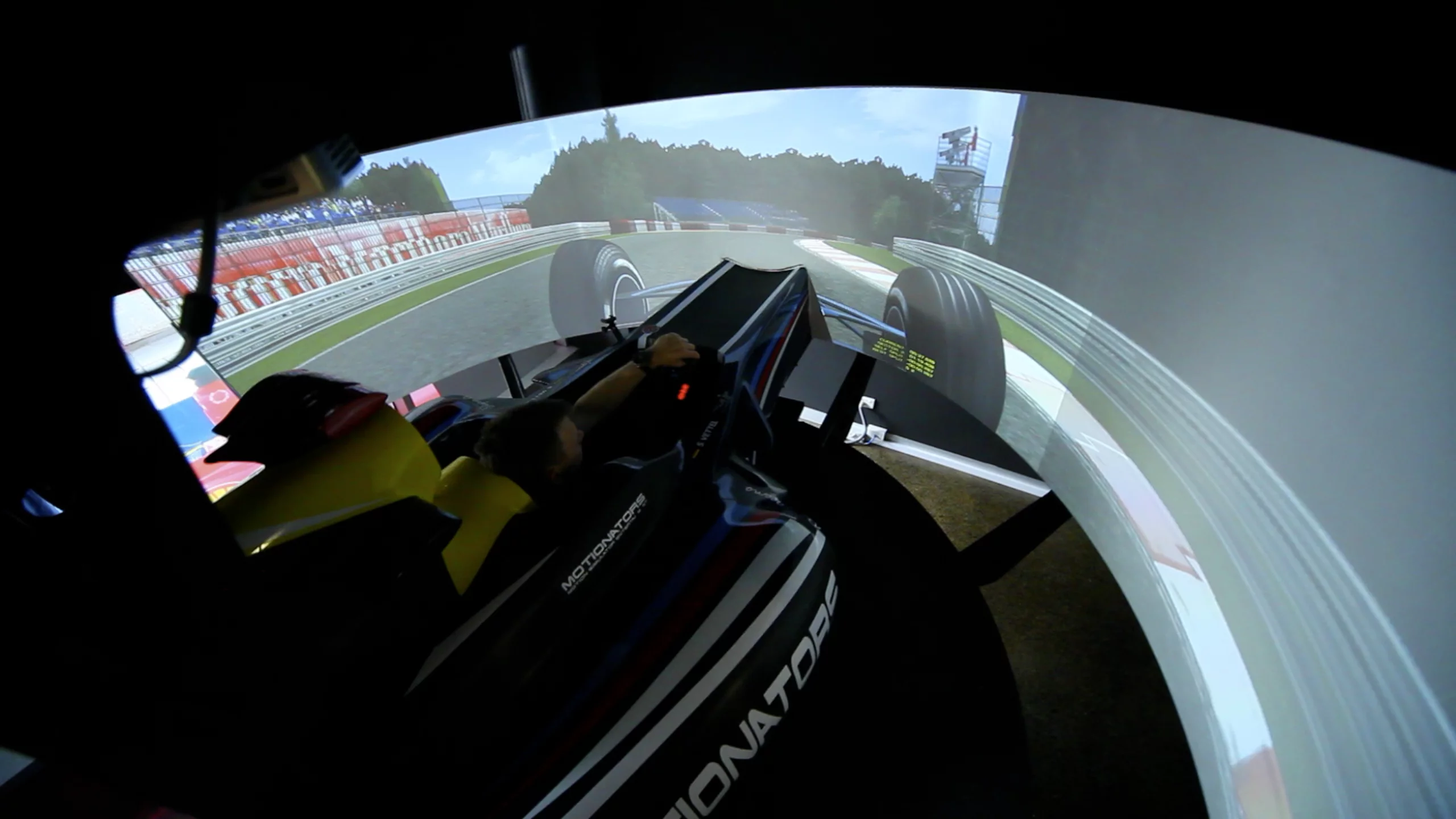 F2000 racer Scott Andrews in the Motionators simulator