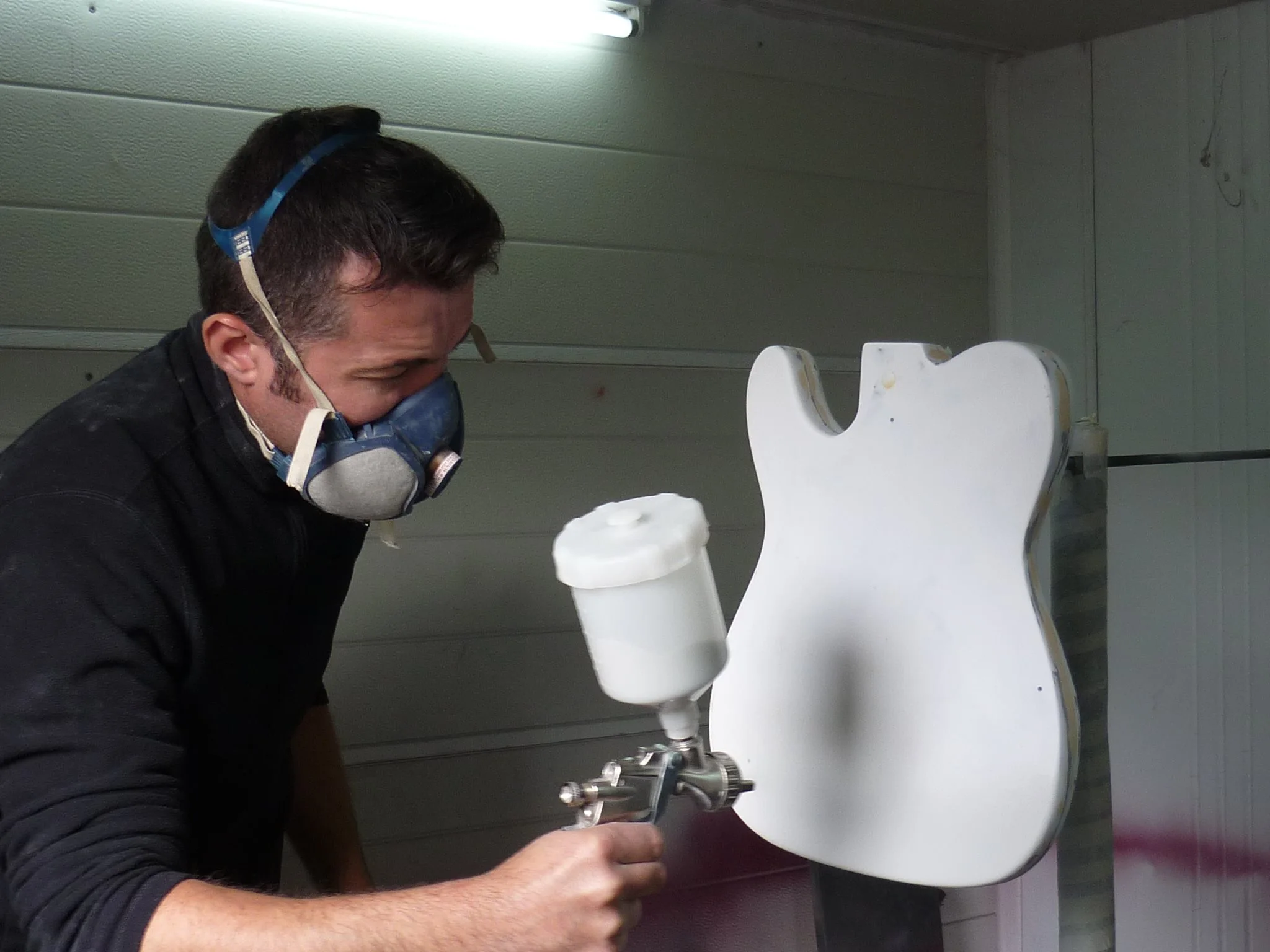 Kompozit's Yann Airiau applying the finish to the fiberglass body