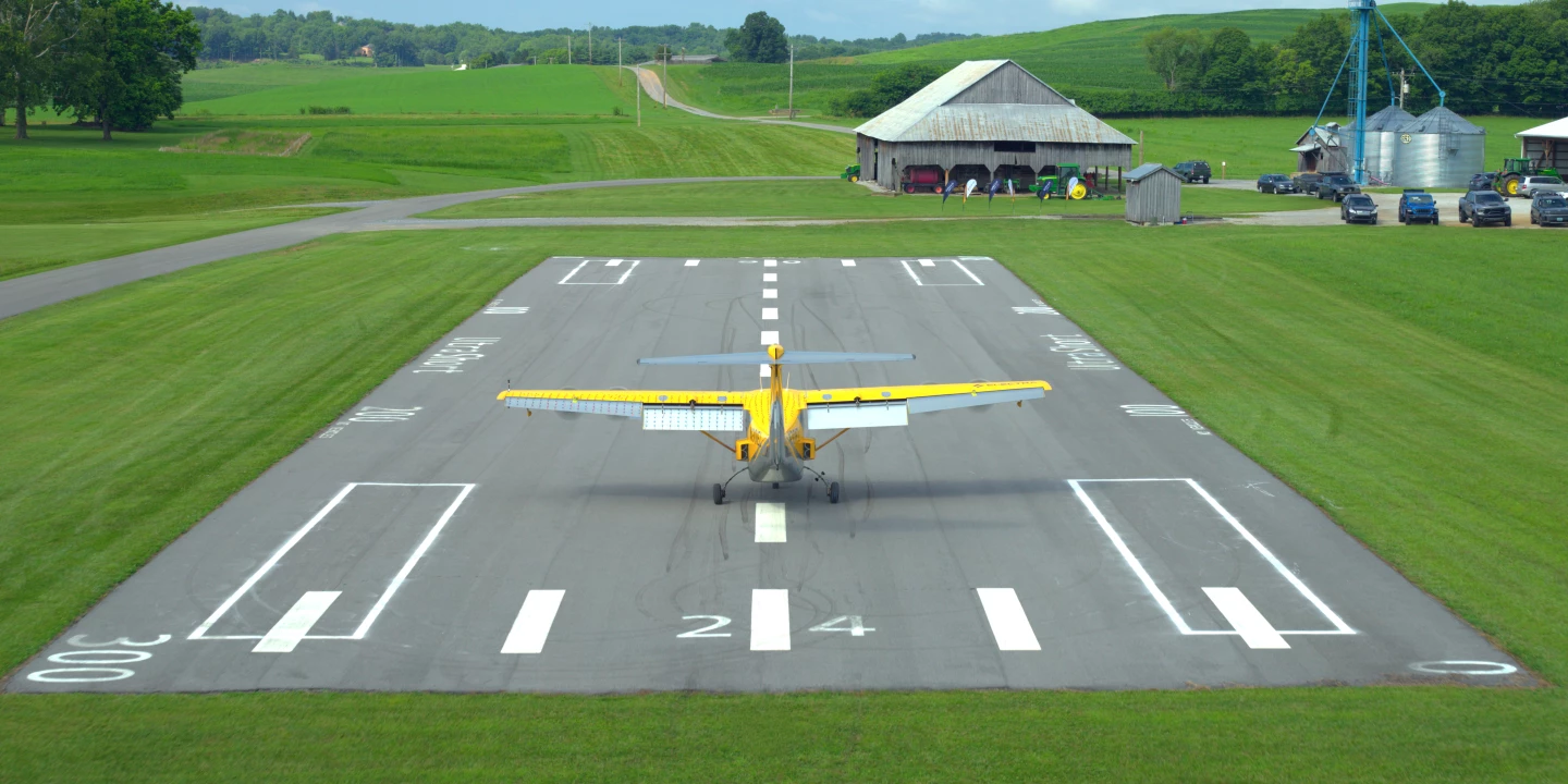The EL2 prototype took off and landed using a short paved runway, a grass field and a section of road