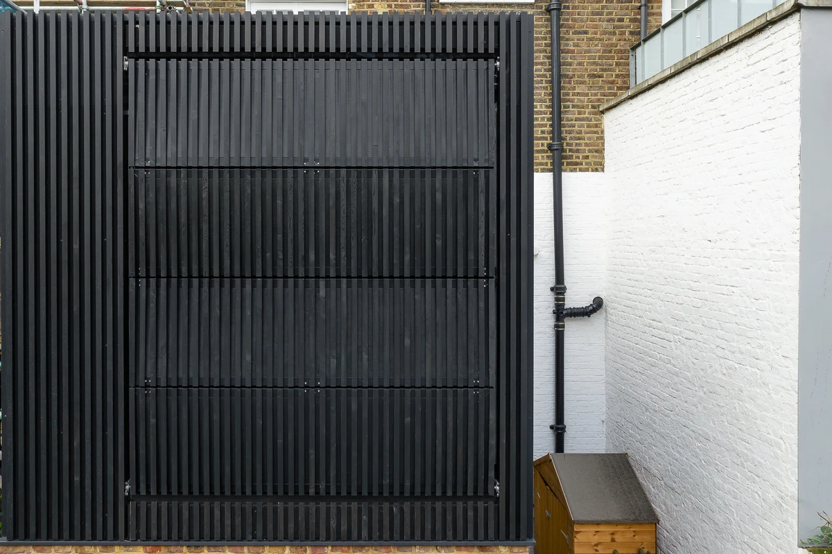 Black Box's shutters are clad in dark stained Siberian Larch