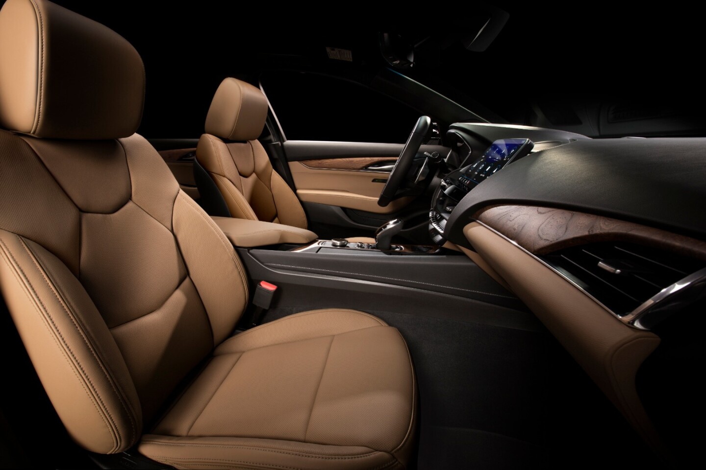 Inside, Cadillac focuses on American-style luxury and new tech
