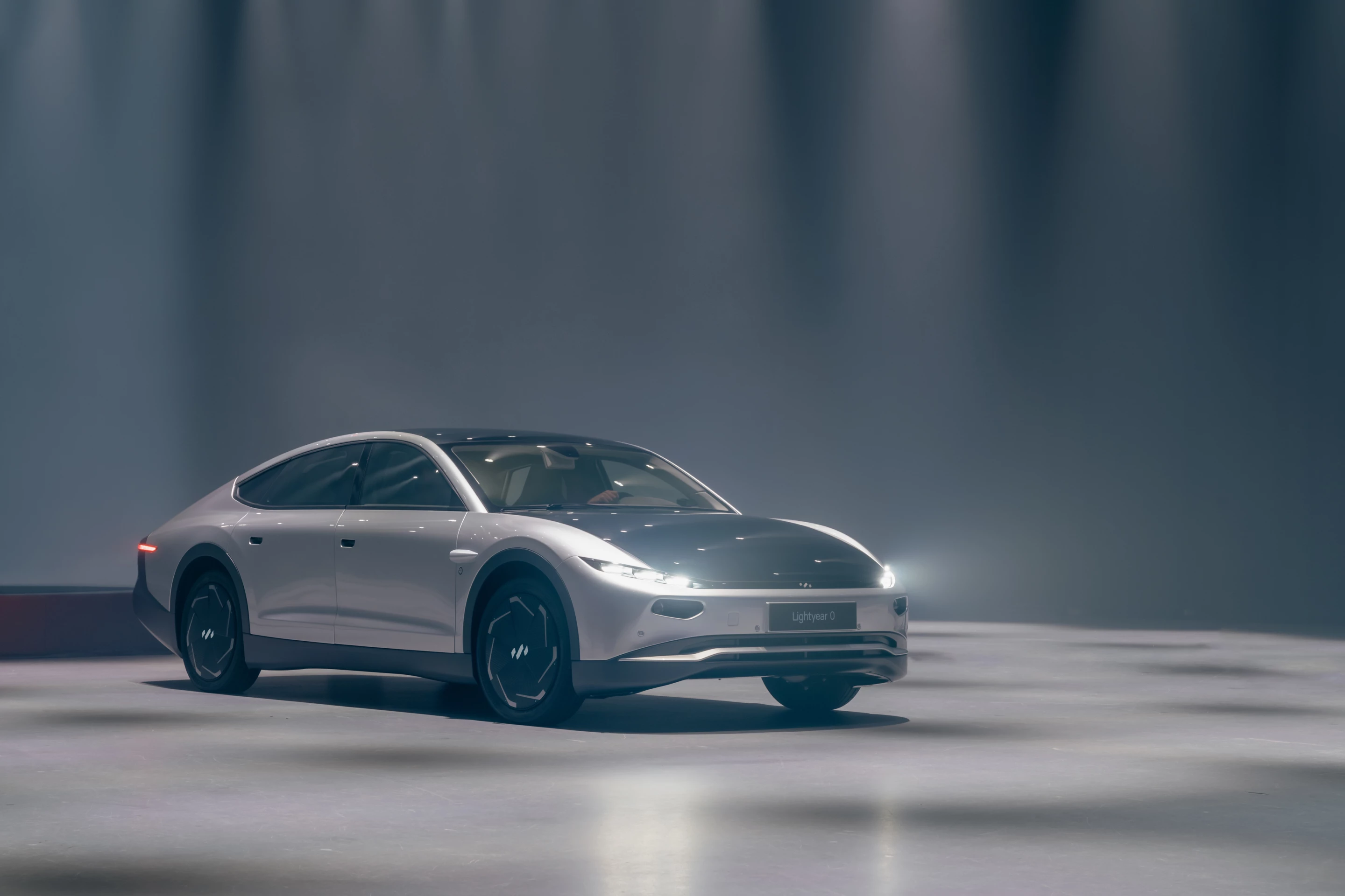 With smooth wheel covers and a very slippery shape, this fastback has the lowest drag coefficient of any family car in history