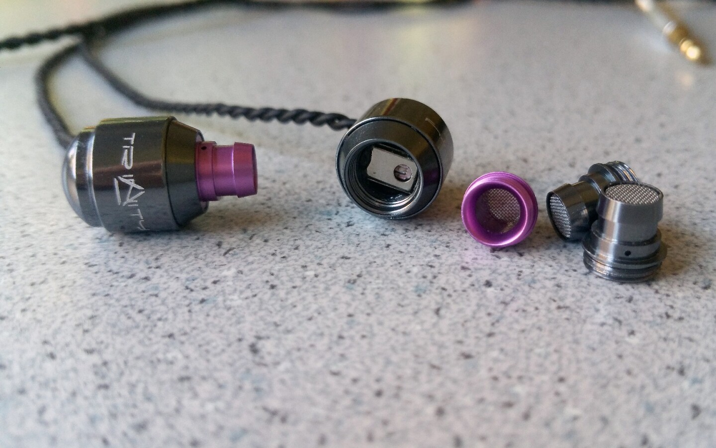 The Trinity Audio Delta IEMs purple filters deliver a "vivid" sound signature