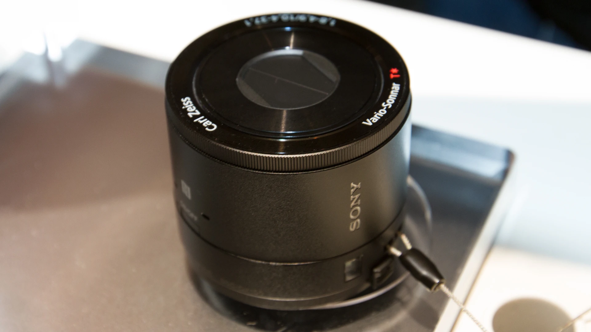 The QX10 (pictured) and QX100 can be used as cameras if within Wi-Fi range of a mobile device