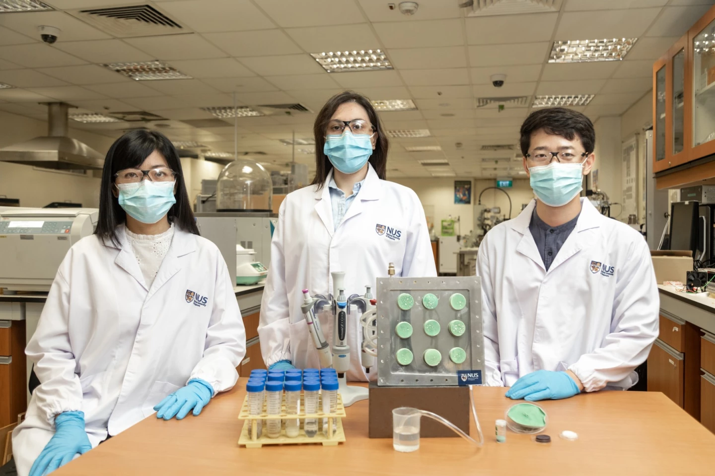 The research team behind a new aerogel that collects water from the air, Professor Ho Ghim Wei (left), Dr Gamze Yilmaz (center) and Dr Fan Lu Meng (right)