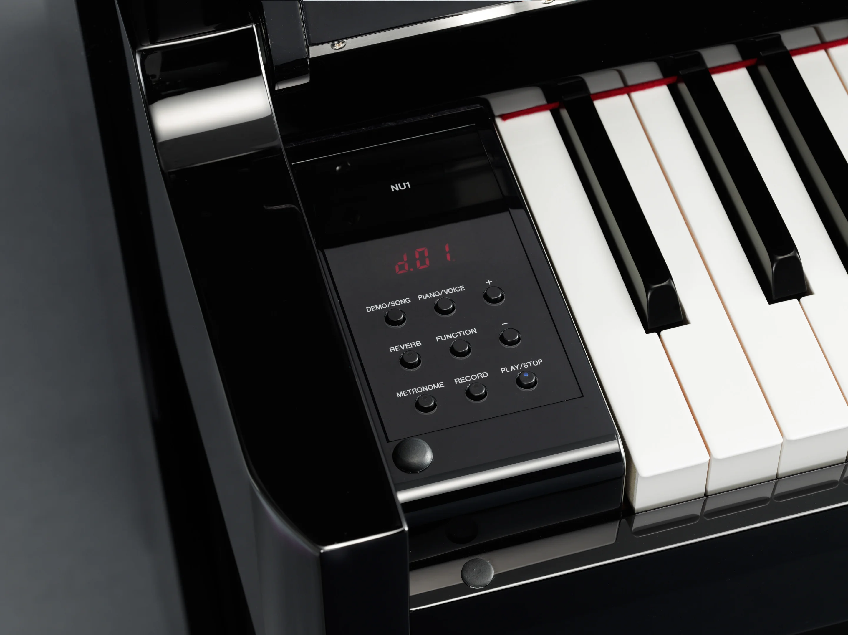 The user is offered a selection of five piano voices, 50 preset songs and five demos, and an included reverb effect
