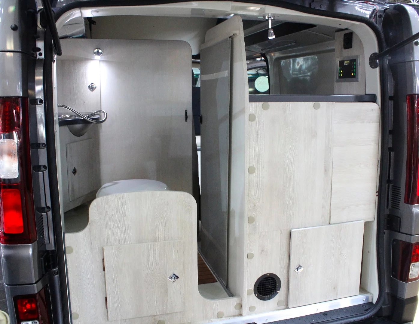 The Danny 530's rear bathroom and passenger-side cabinetry