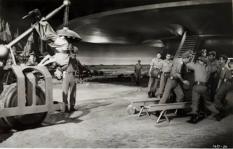 Production still showing uniform shirts