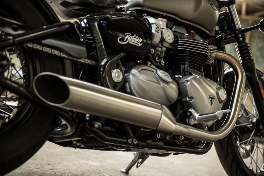 Slash cut pipes will come standard on the Triumph Bonneville Bobber, and a partnership with Vance & Hines will give owners an optional and adjustable end cap