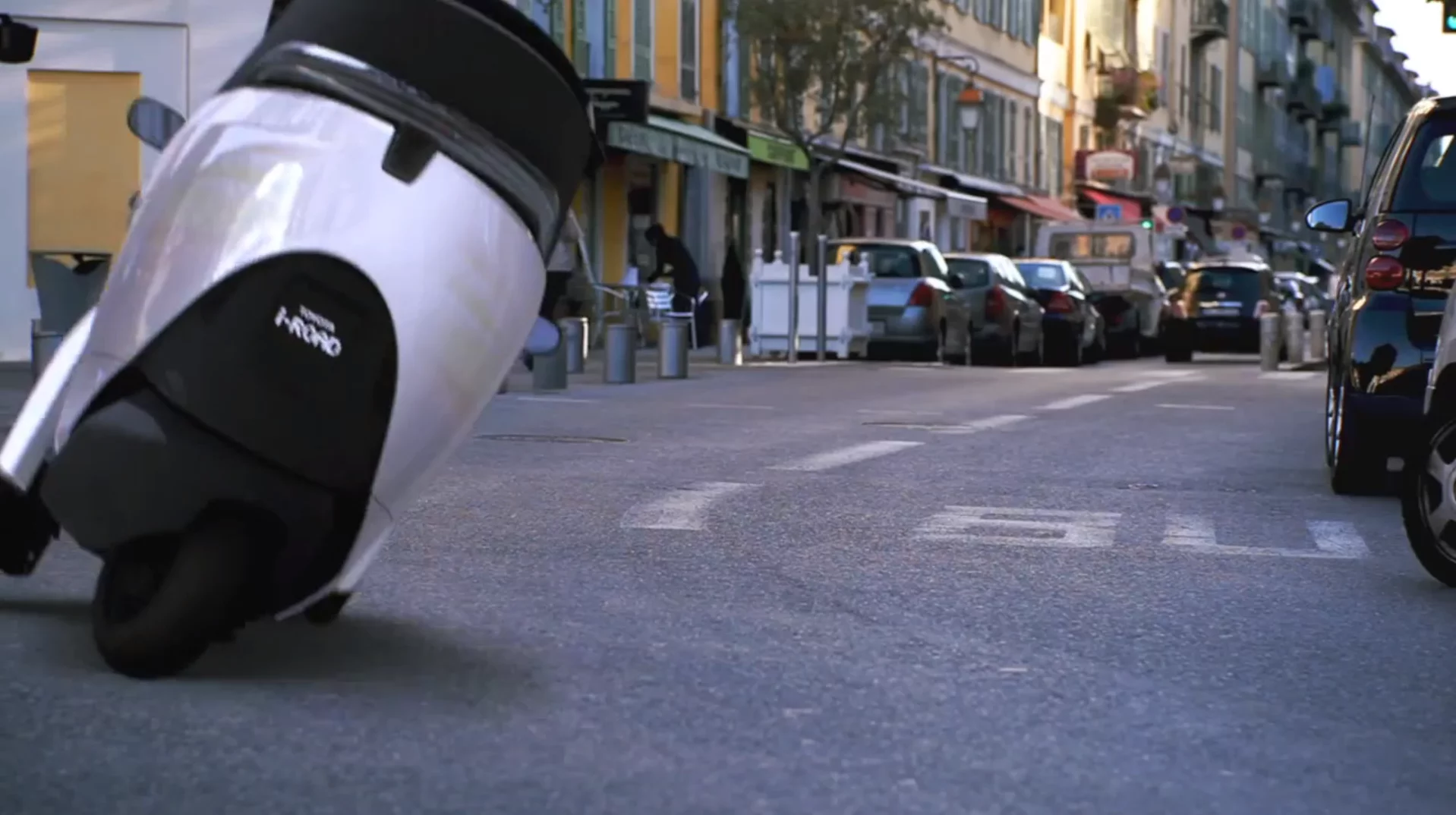 Toyota's i-ROAD is a fully-enclosed, two-seater, three-wheeled, fully-electric, Personal Mobility Vehicle (PMV)