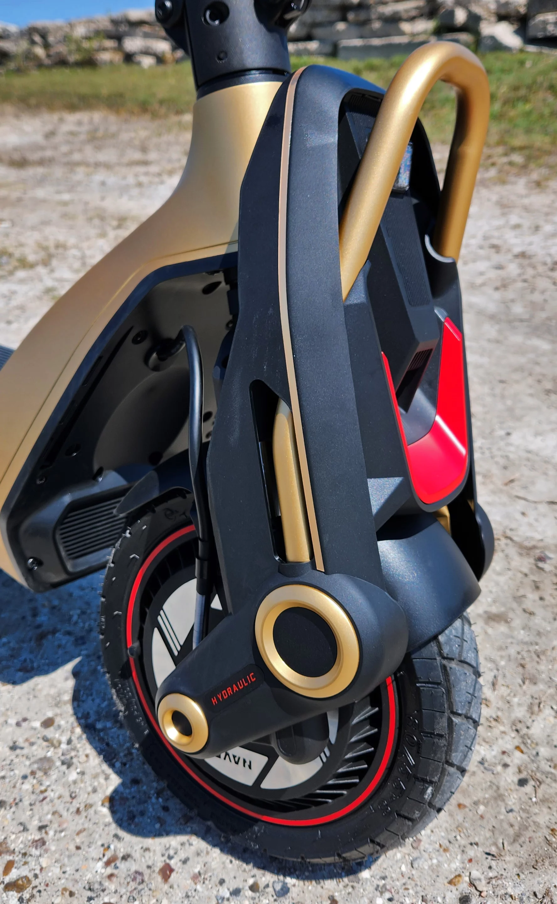 It looks like a chic, luxury stand-up scooter designed by a thin Italian man in a pinstriped suit with a Clark Gable mustache whose reference images were superyachts and Gizmoduck from DuckTales