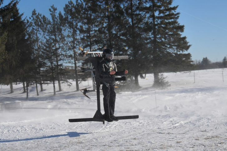 A Skypak flight demo, with Mitchell the mannequin on board and a large wooden frame holding the whole thing up
