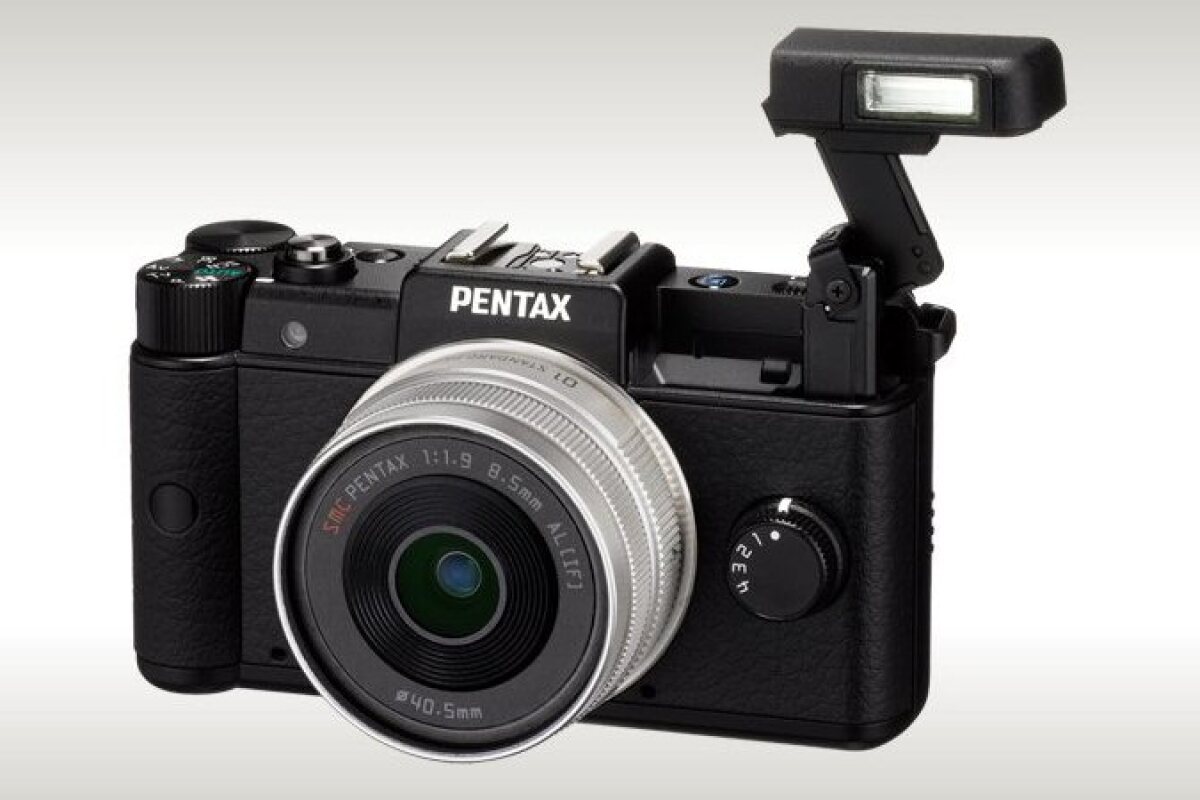 Pentax is about to release what is claimed to be the world's smallest and lightest interchangeable lens camera, and the first to sport its new Q lens mount