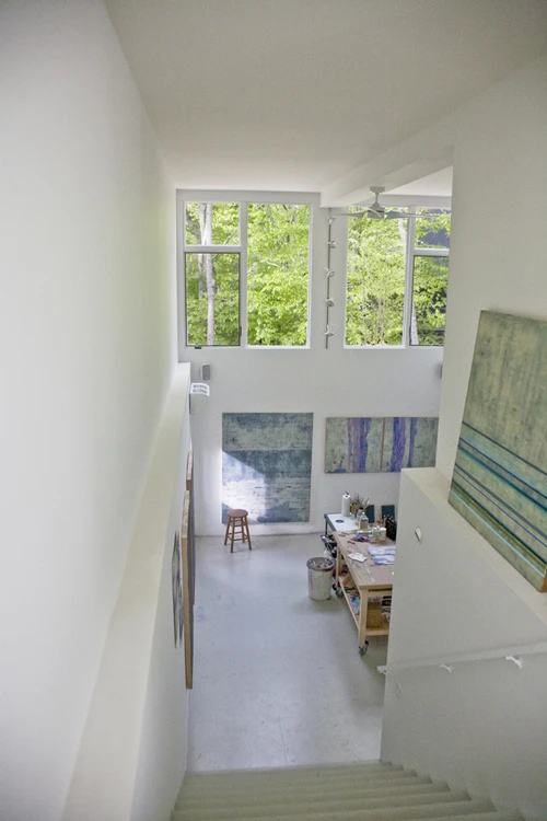 The Container Studio exuberates light and space, contrasting from its dark charcoal exterior