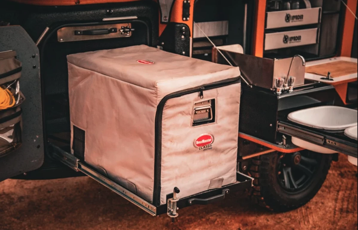 The heavy-duty fridge slide packs room for a tried-and-true South African fridge from SnoMaster or National Luna, or an import of choice