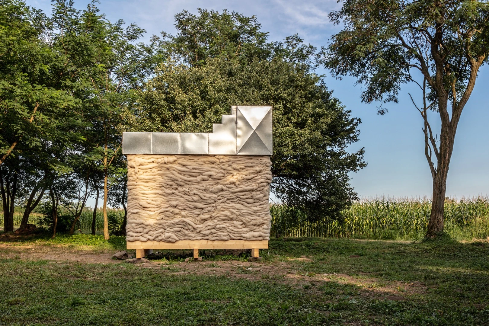 Hello Wool is both clad and insulated with wool, and is envisioned as a quiet retreat for use by just one person