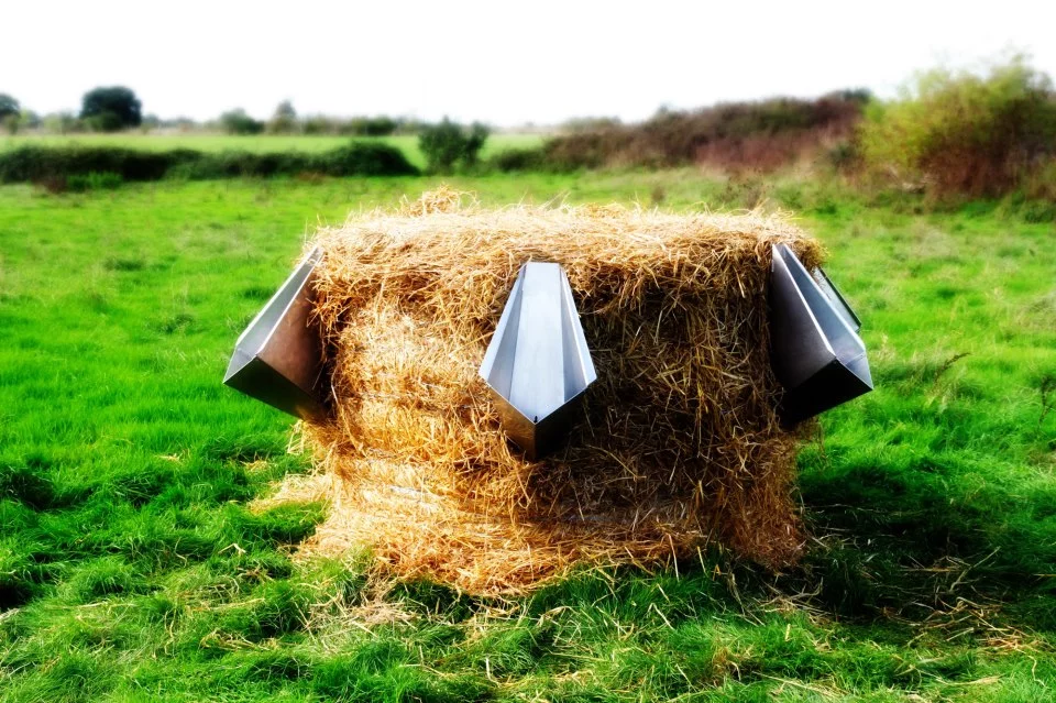 L'Uritonnoir is a portable, composting urinal for large festivals that reduces a bale of hay into usable fertilizer