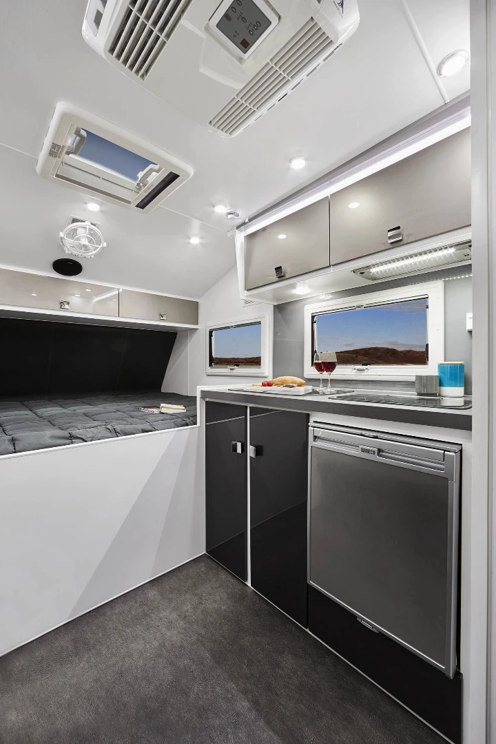 Kitchen and queen bed