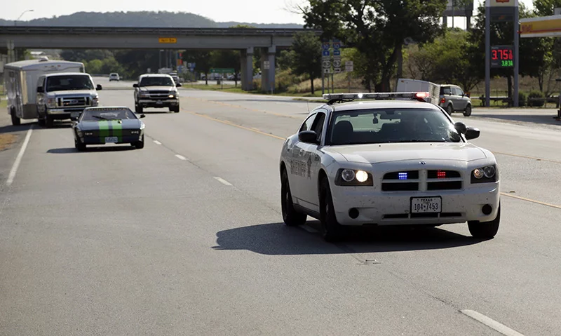 The team was treated to a police escort as they entered Junction, Texas