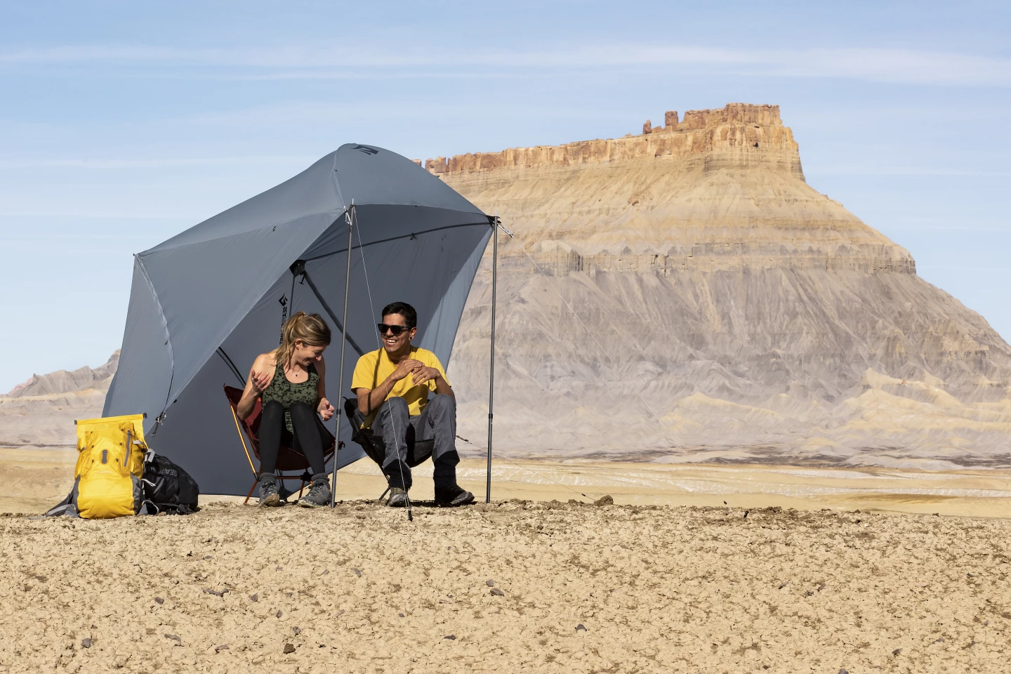 The Telos rain fly sets up as a sun shelter when secured to trekking poles or the available pole conversion kit