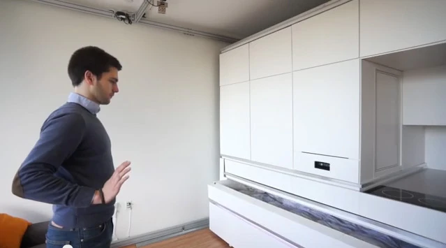 The CityHome project solves typical spatial issues through hidden amenities controlled by hand gestures, interactive touch elements and voice commands