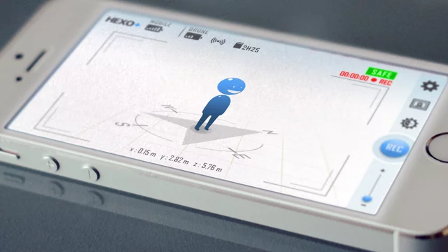 The user utilizes an included app to indicate the perspective from which they wish to be filmed