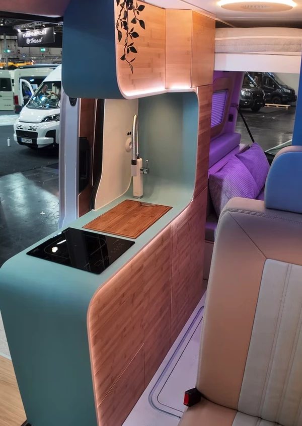 Camper Schmiede's kitchen design closes it off from the exterior of the van