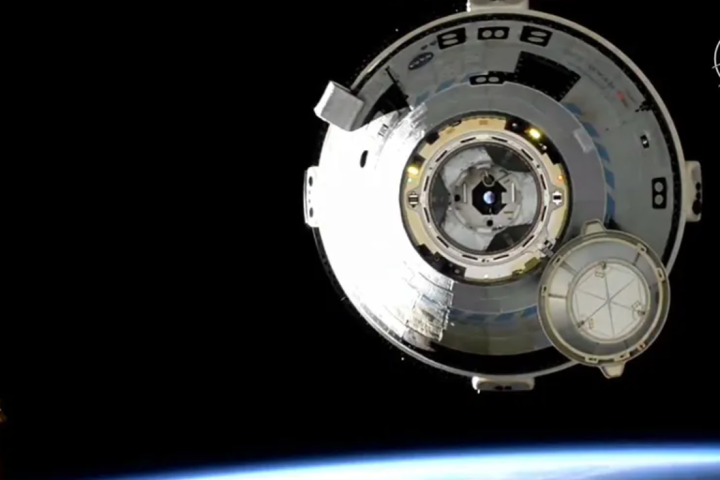 Starliner departing from the ISS