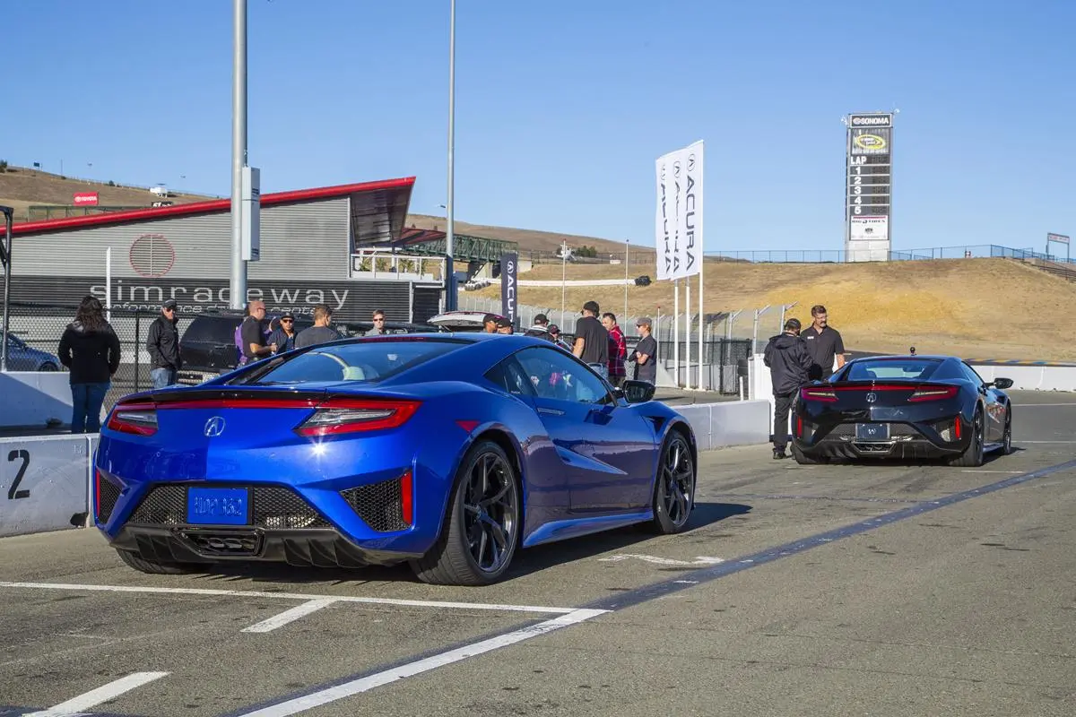 The battery pack in the 2017 NSX is located below the center console to optimize weight distribution, lowering the center of gravity for the car
