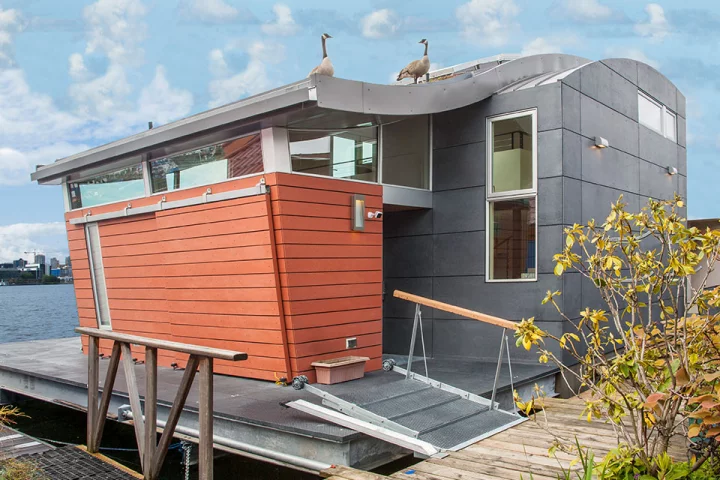 Houseboat H features both a roof-based solar array and a green roof section