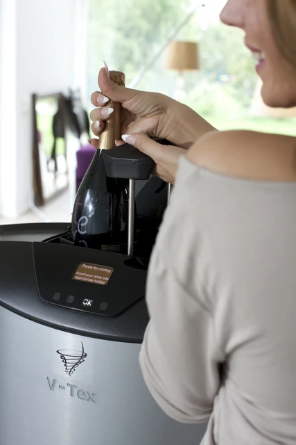 A wine bottle being loaded into the V-Tex