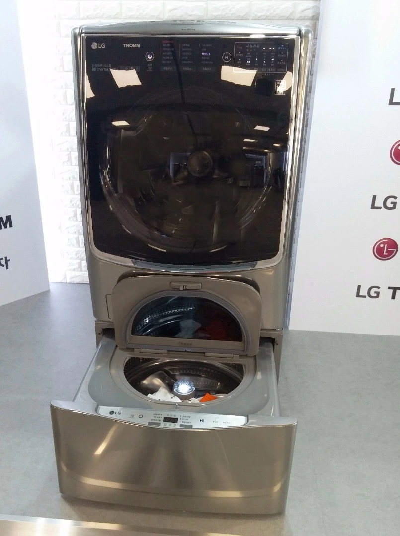 The lower compartment is designed to take smaller loads, like perhaps underwear or those few annoying leftover white items that don't quite warrant an entire load on their own