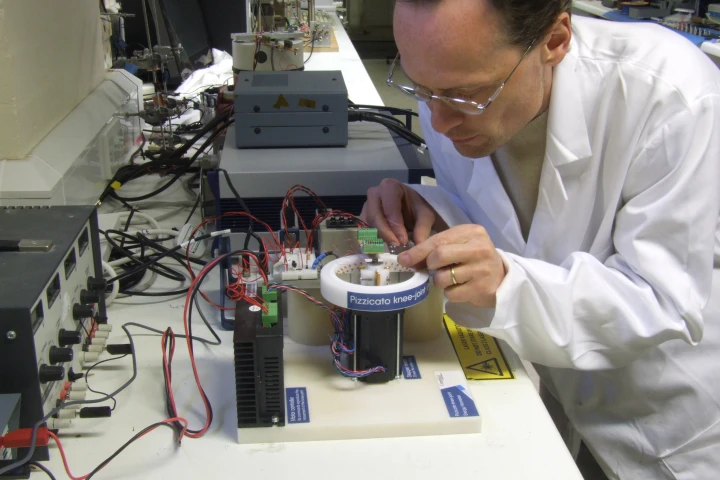 The lab prototype of the pizzicato knee-joint energy harvester