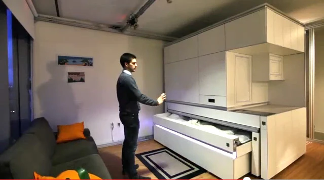 The CityHome project solves typical spatial issues with hidden amenities controlled by hand gestures, interactive touch elements and voice commands