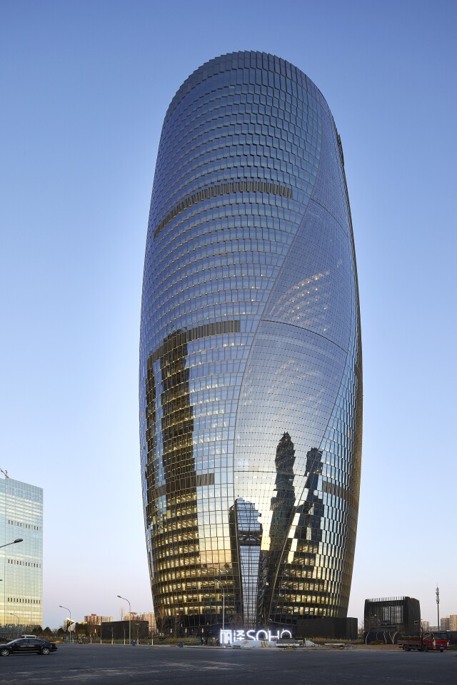 Leeza Soho rises to a height of 207 m (679 ft)