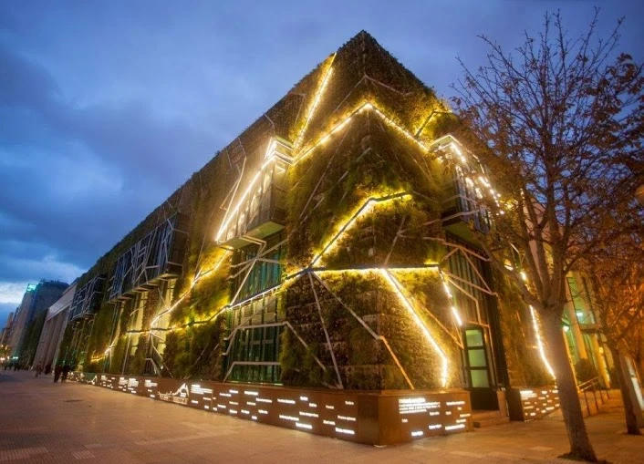 The lit-up frame wrapped around the building