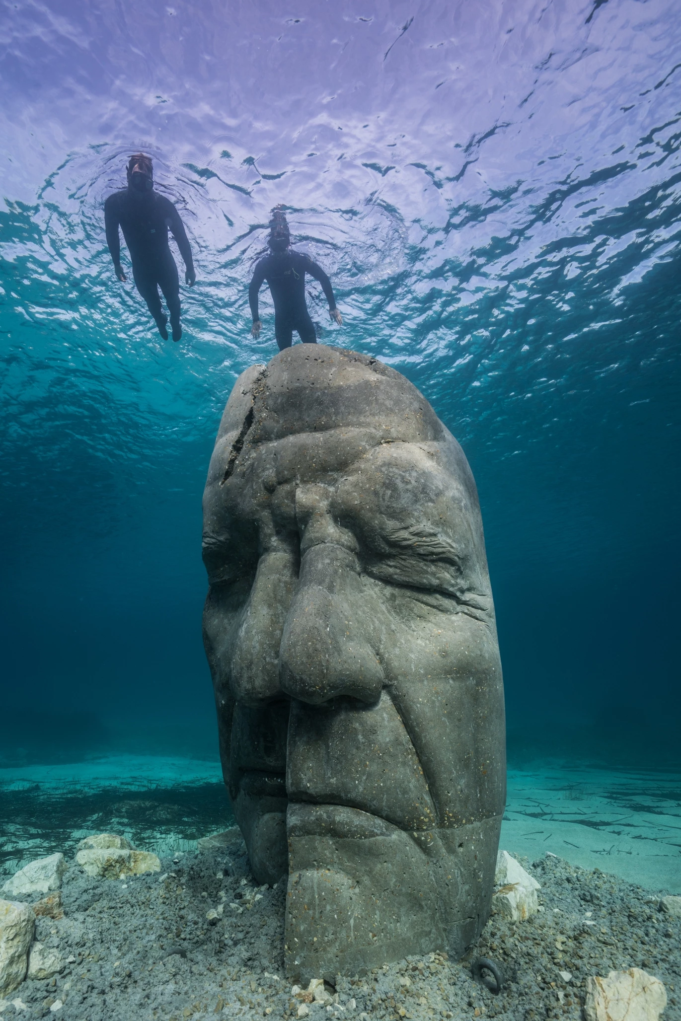 The Underwater Museum of Cannes' sculptures' mask-like design references the Man with the Iron Mask, says the artist