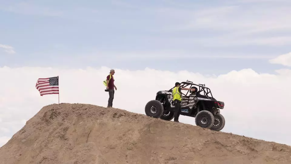 Godfrey prepares to break the world distance jumping record in a Polaris RZR