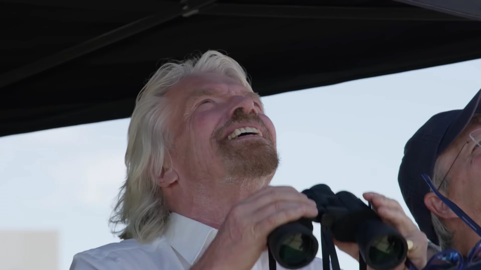 Founder Richard Branson looks on during Virgin Galactic's latest testing of its spaceplane