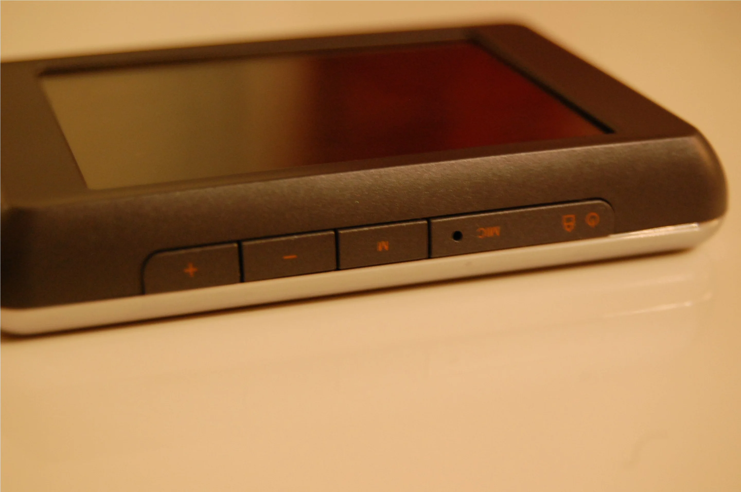 Along the top are some control buttons, including power/hold and a useful Menu key, which returns you to a top level screen wherever you may be within the player
