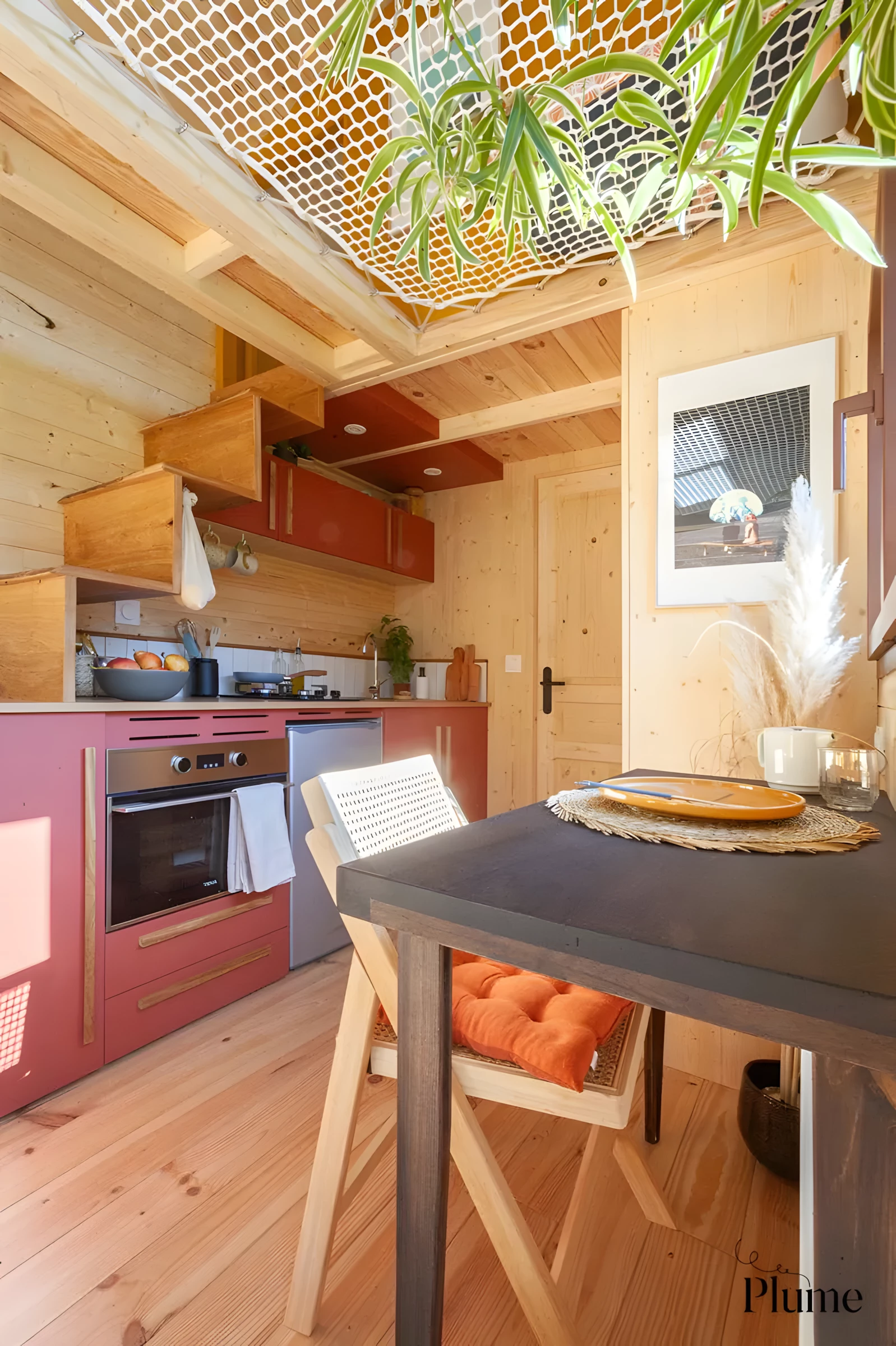 The Cosmos' kitchen includes a small dining table and quite a lot of storage space