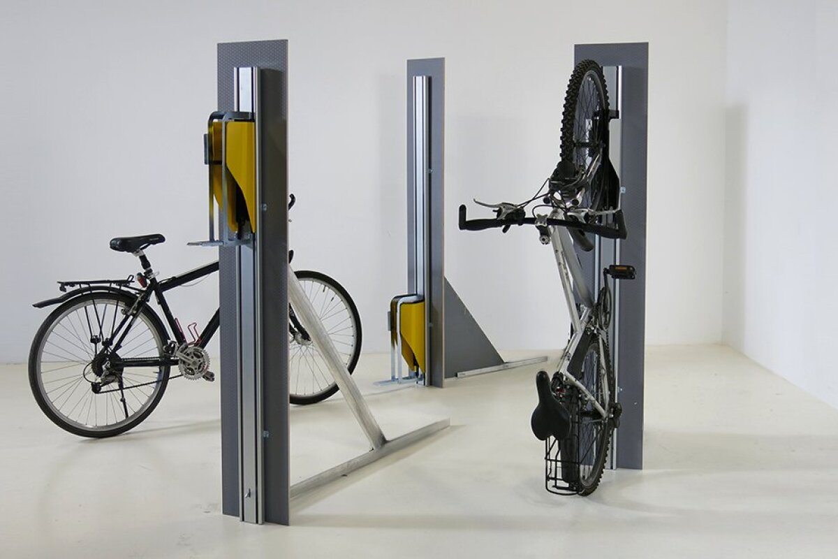 Springloaded system makes bike parking an uplifting experience