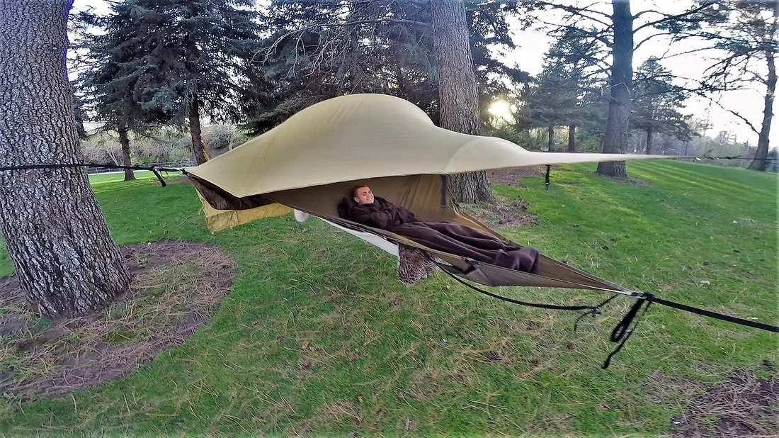 The roof of the Treble Hammock 2.0 can be left partly open to be protected from the elements but still enjoy the view