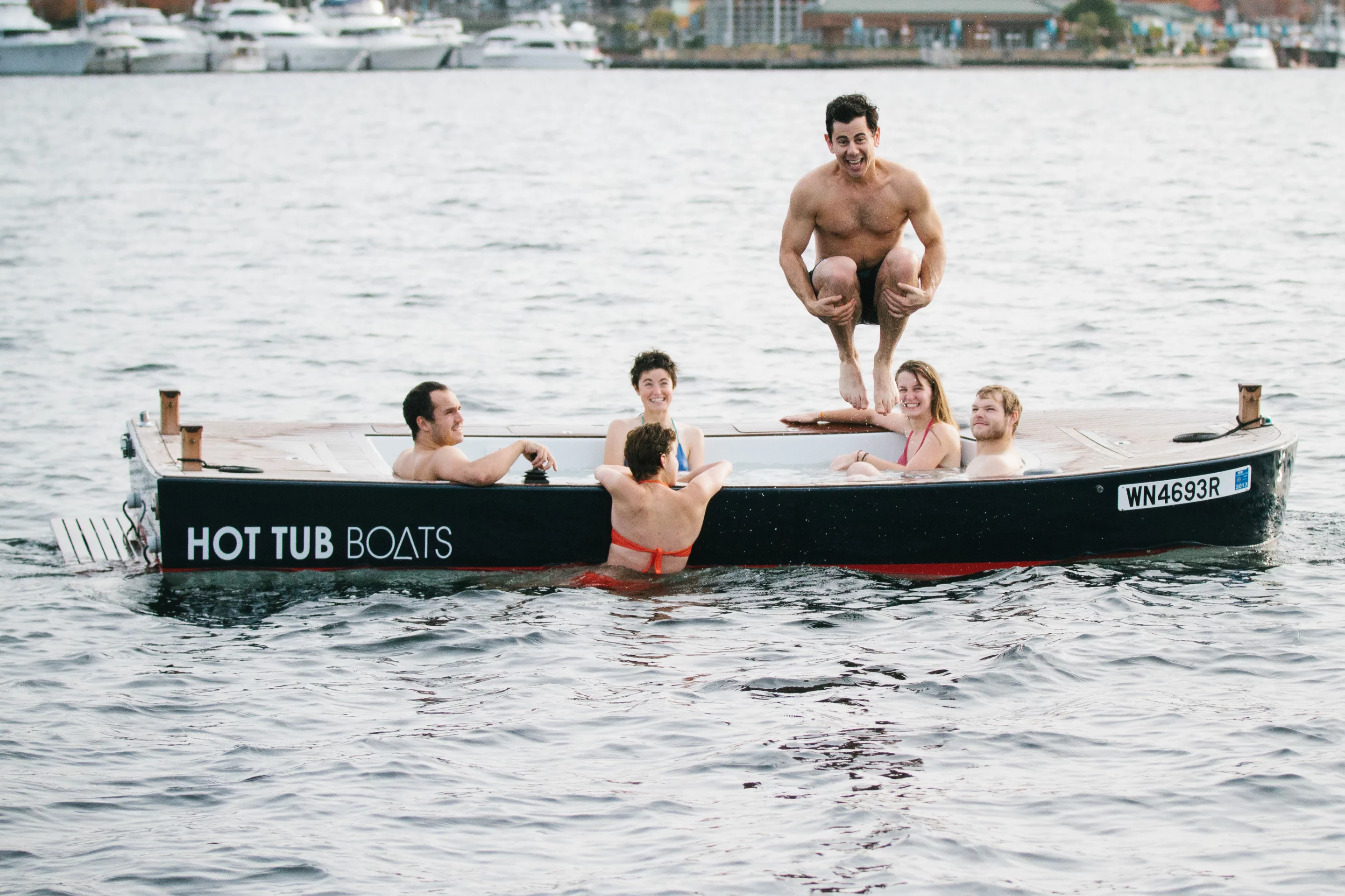 The Hot Tub Boat allows its passengers to soak while they cruise